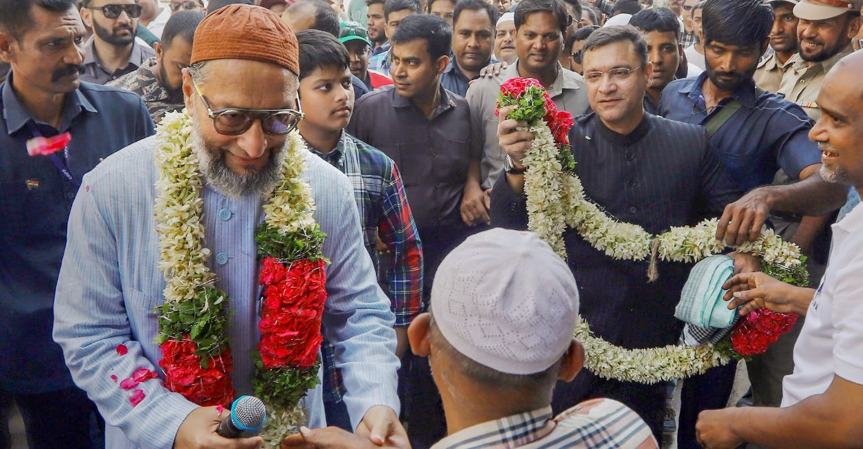 AIMIM president Asaduddin Owaisi with his brother and party's MLA Akbaruddin Owaisi during a door-to-door campaign ahead of the Telangana Assembly elections, at Chandrayangutta constituency in Hyderabad, Friday, November 10, 2023. Photo: PTI